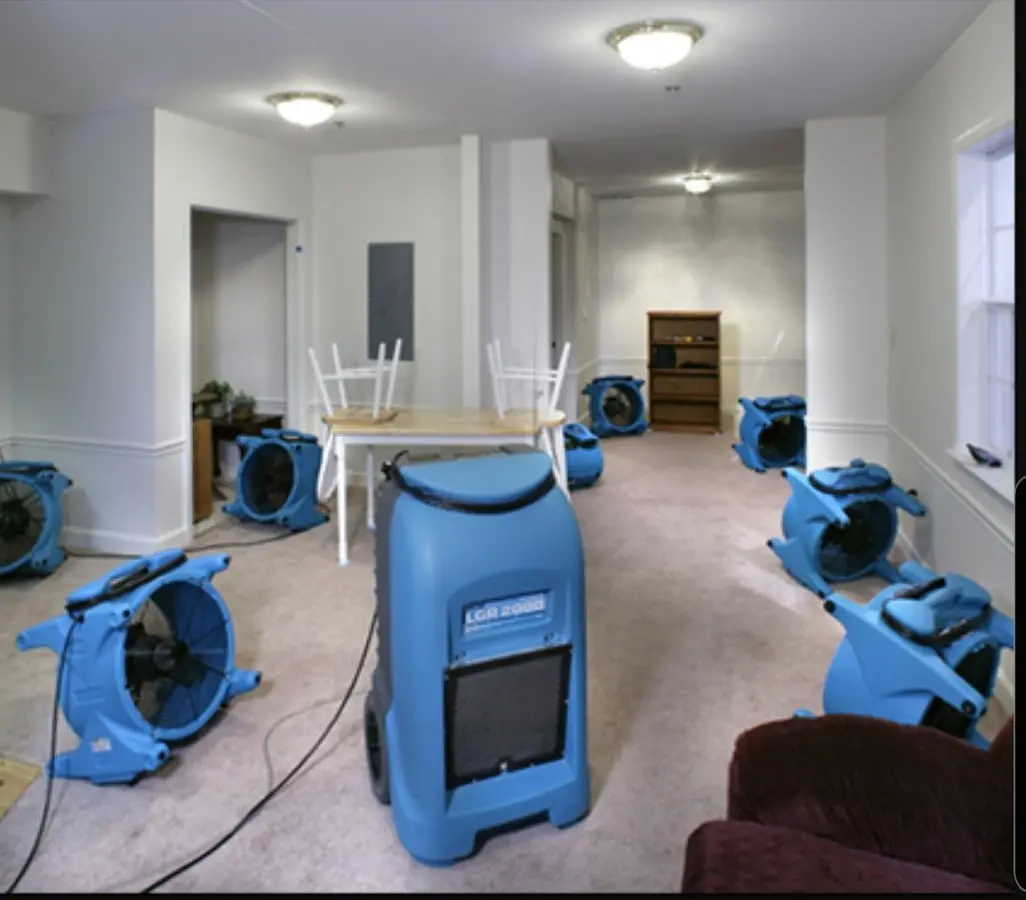 Air movers and dehumidifier setup for Water Extraction & Removal in Monterey
